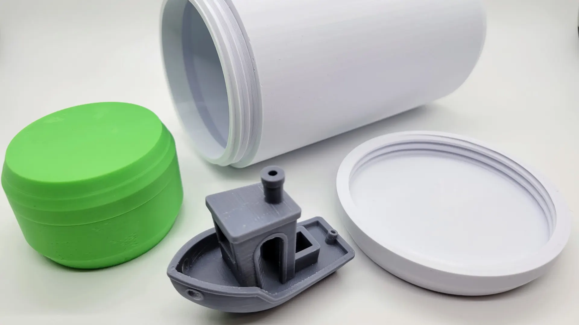 A render of a 3d printed customizable threaded cylindrical storage container