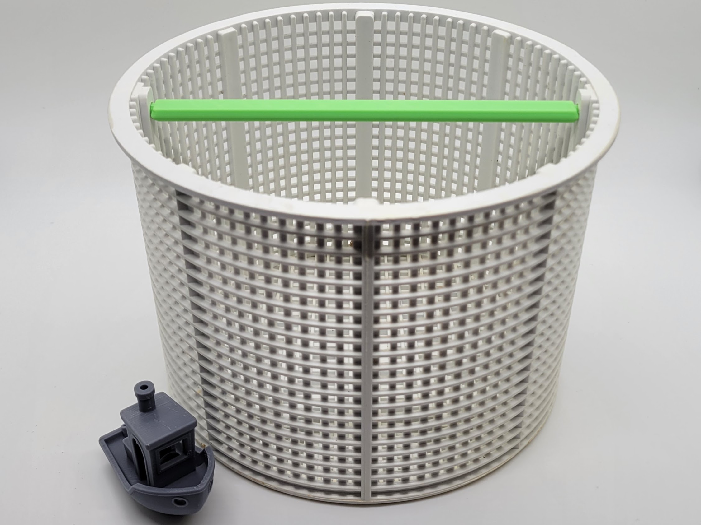 A render of a replacement handle for a skimmer basket