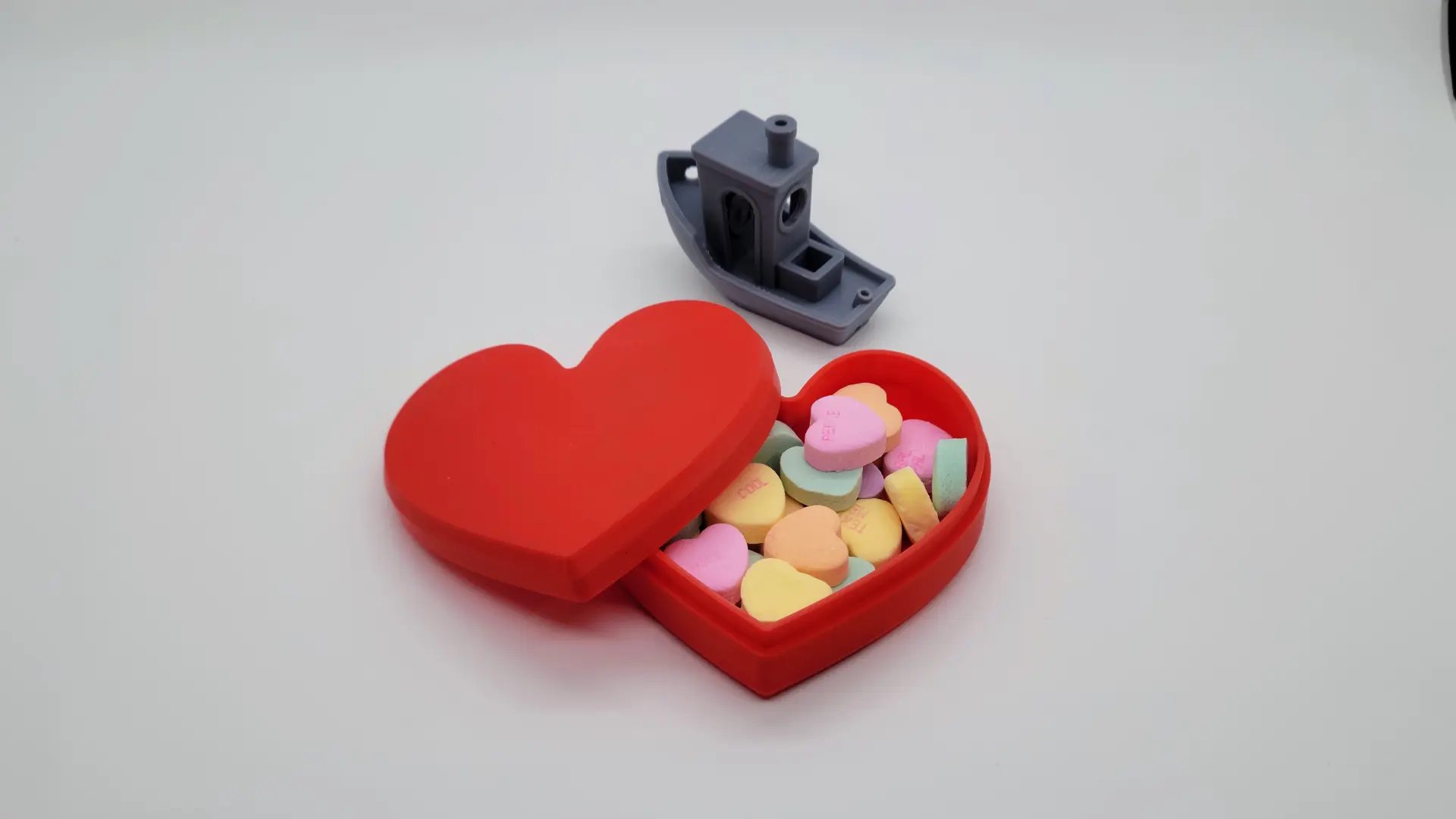 A render of a 3d printed heart shaped storage box