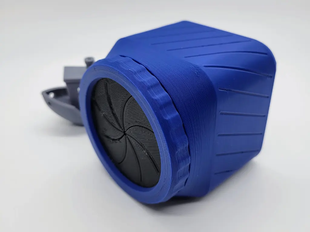 A photo of a 3d printed customizable magnetic base square shaped scrap bin featuring a screw on lid and TPU gasket