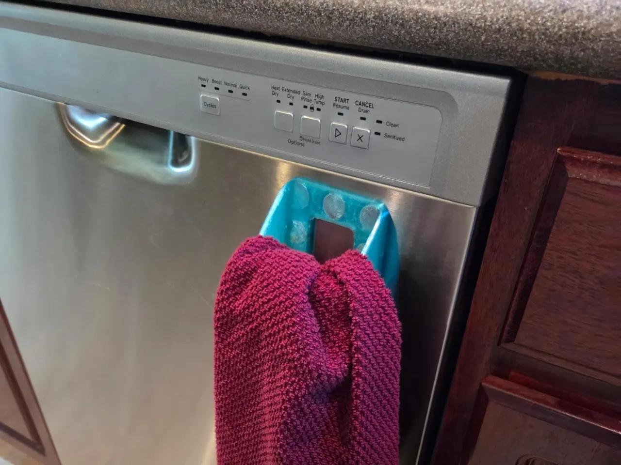 TPU towel holder on a dishwasher handle